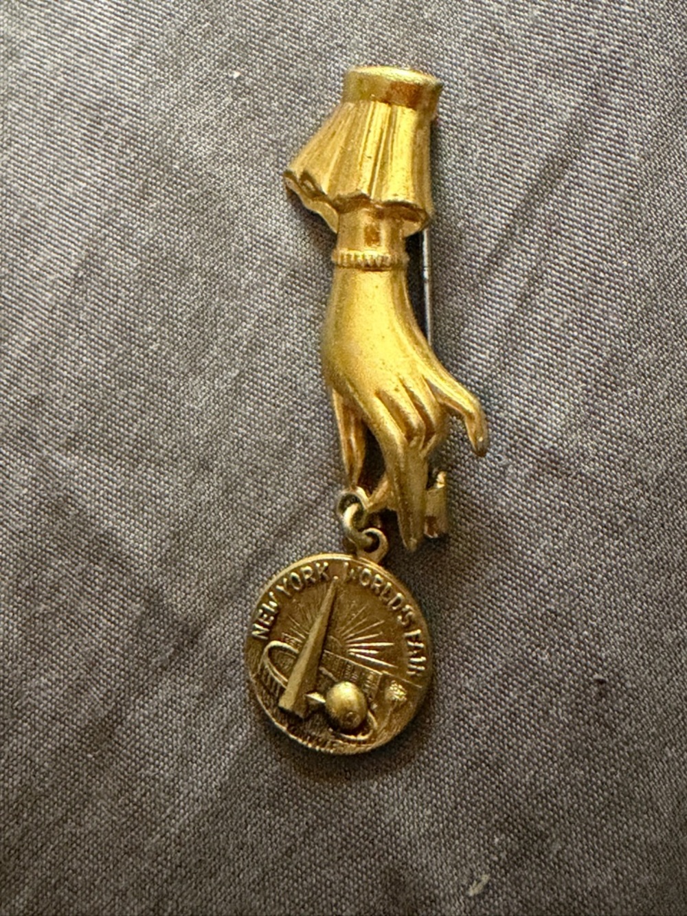 Vintage Gold New York Worlds Fair Hand Charm Brooch with Dangle Medal